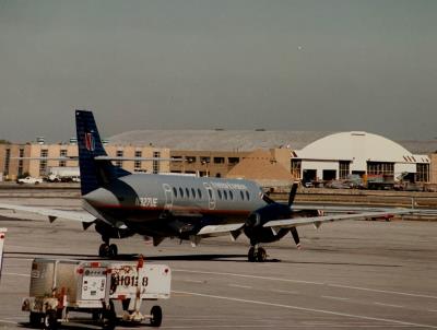 Photo of aircraft N327UE operated by Atlantic Coast Airlines