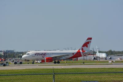 Image of aircraft registration C-GKOB - A A319-112 operated by Air Canada Rouge