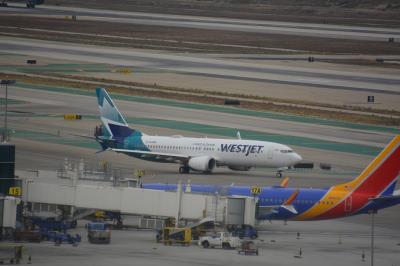 Photo of aircraft C-GAMQ operated by WestJet