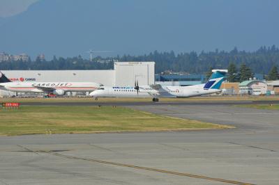 Image of aircraft registration C-FOWE - A DHC-8-402Q operated by WestJet Encore