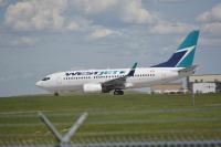 Photo of aircraft C-GWSQ operated by WestJet
