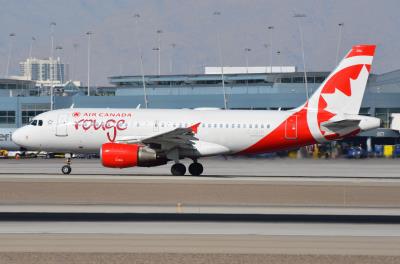 Image of aircraft registration C-GITP - A A319-112 operated by Air Canada Rouge