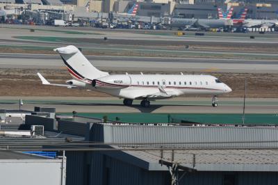 Photo of aircraft N112QS operated by NetJets