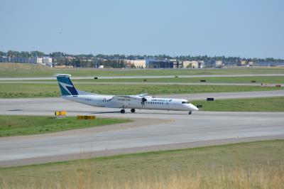 Image of aircraft registration C-GWJK - A DHC-8-402Q operated by WestJet Encore