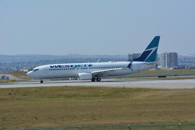 Photo of aircraft C-FAWJ operated by WestJet