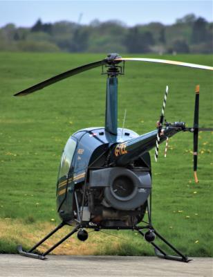 Image of aircraft registration G-TILE - A R22 Beta operated by Heli Air Ltd