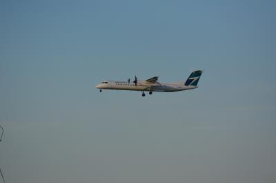 Image of aircraft registration C-GWJK - A DHC-8-402Q operated by WestJet Encore