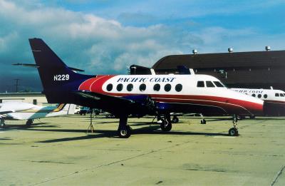 Photo of aircraft N229 operated by Pacific Coast Airlines