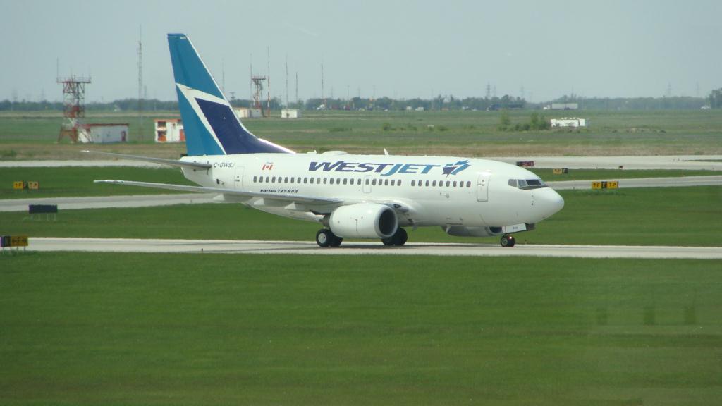 Photo of aircraft C-GWSJ operated by WestJet